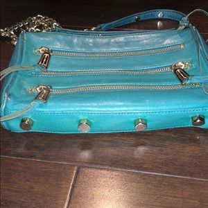 Teal cross body